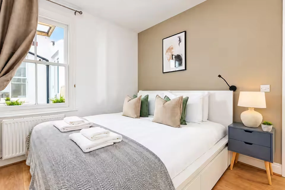 Styled double bedroom with fresh linen